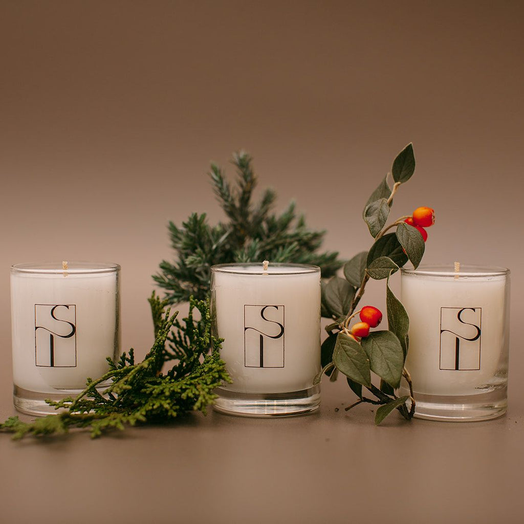 Three winter votive candles